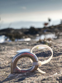 Close-up of bicycle on beach