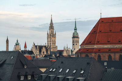 Panoramic view of buildings in city against sky