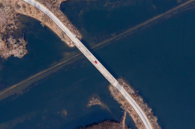 Aerial view of bridge over river against sky