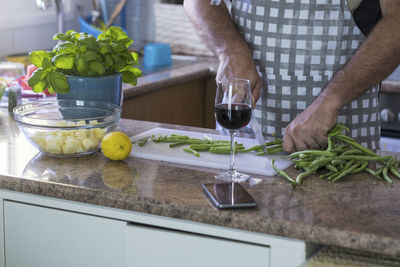 Man preparing food on cutting board