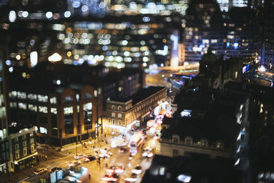 High angle view of traffic on city street at night