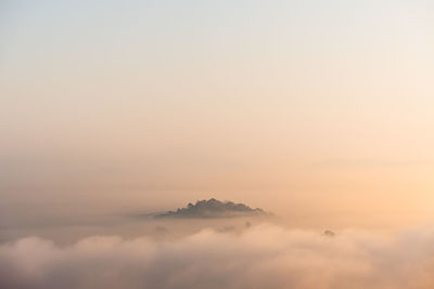 Scenic view of mountains against sky during sunset