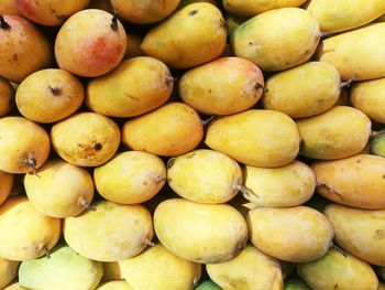 Full frame shot of mangoes at market for sale