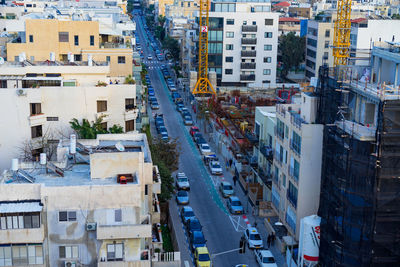 High angle view of street amidst buildings in city