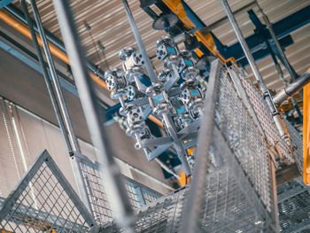 Low angle view of machinery in factory