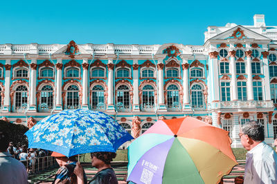 People in front of building