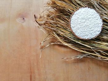 High angle view of wheat on table