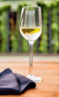 Close-up of wineglass on table