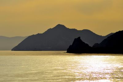 Scenic view of mountains at sunset