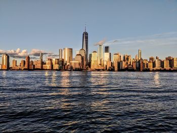 Sea with buildings in background