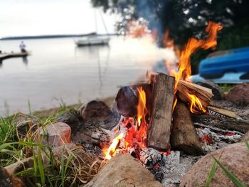 View of bonfire on log