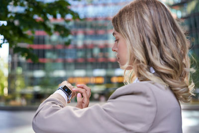 Young woman using mobile phone