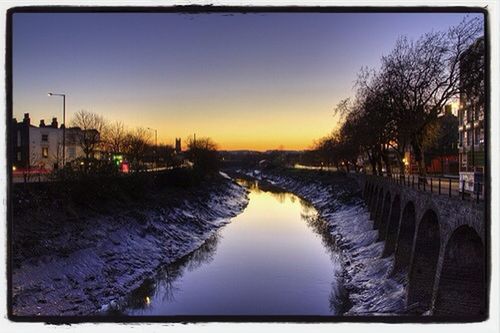 transfer print, auto post production filter, water, clear sky, winter, snow, tree, cold temperature, sunset, reflection, nature, season, bare tree, sky, tranquility, tranquil scene, canal, river, beauty in nature, scenics