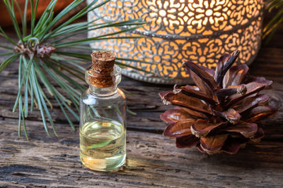 Close-up of glass bottle on table