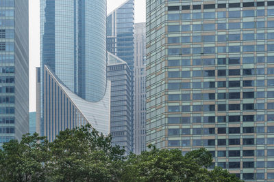 Low angle view of modern buildings in city