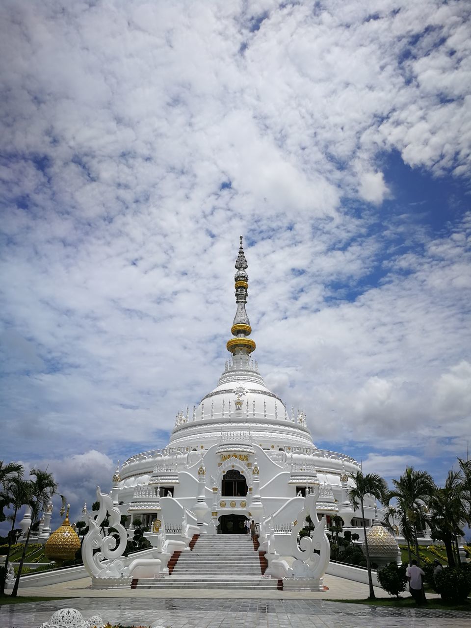 architecture, religion, sky, belief, built structure, cloud, spirituality, travel destinations, landmark, temple - building, building exterior, place of worship, travel, nature, building, history, the past, tourism, tower, outdoors, day, no people, tree, temple, city, plant, dome