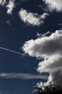 Low angle view of vapor trail in sky