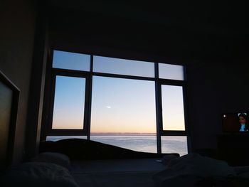 Sea seen through window at home