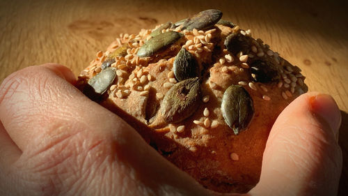 Close-up of hand holding ice cream