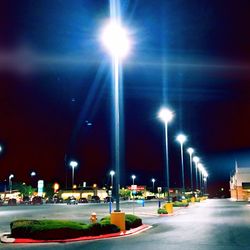 Illuminated street lights at night