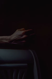 Close-up of woman hand in darkroom