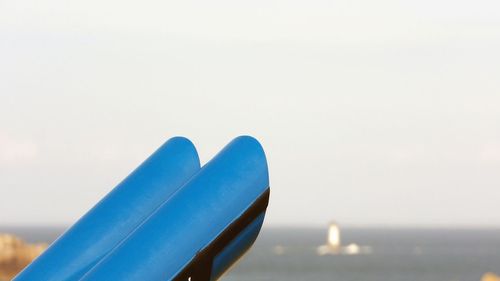 Close-up of blue sea against clear sky