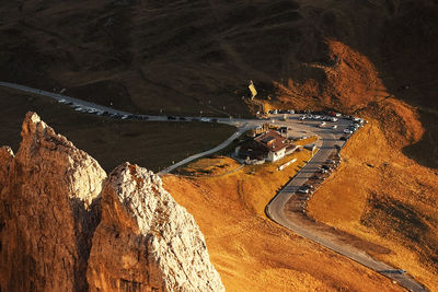 High angle view of road amidst rocks against mountains