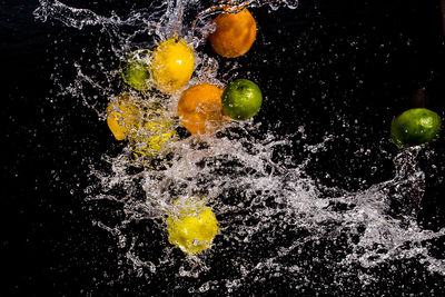 Close-up of colorful balloons in the dark