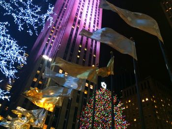 Low angle view of illuminated tree at night