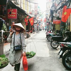 Woman on bicycle in city