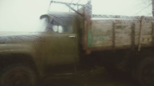 Close-up of wet car window