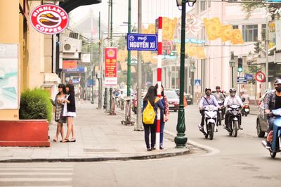 Woman standing in city