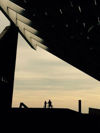 Silhouette of woman at sunset