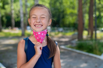 Portrait of cute girl smiling