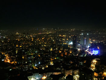 Illuminated cityscape at night