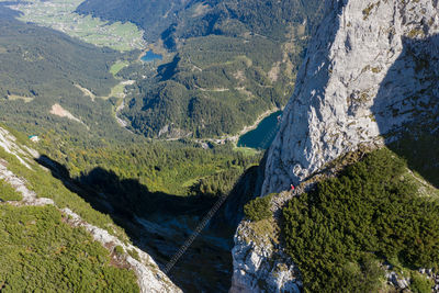 High angle view of people rock climbing