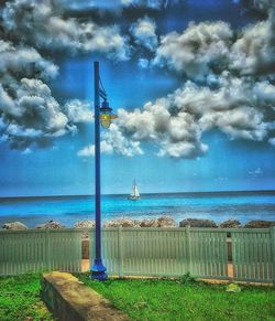 Scenic view of sea against cloudy sky