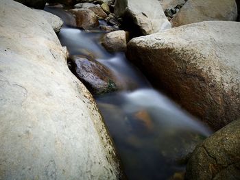 Stream flowing through rocks