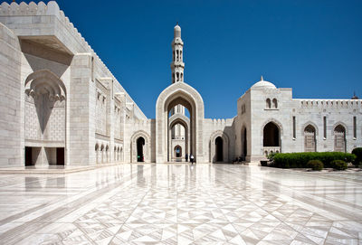 Exterior of historic building against clear blue sky