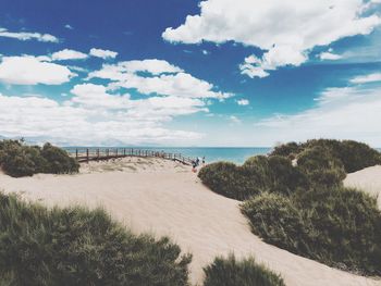 Scenic view of sea against cloudy sky