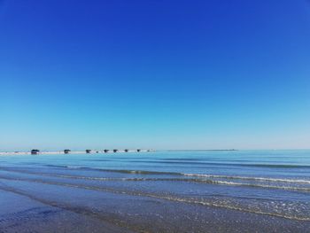 Horizon with fishing houses on the coast 