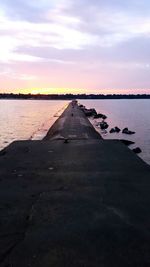 Scenic view of sea at sunset