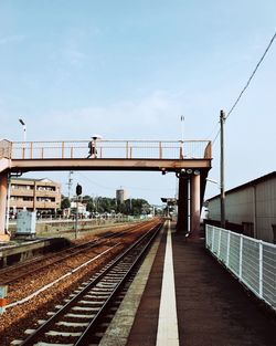 Railroad station platform against sky