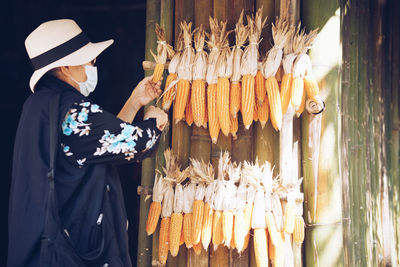 Portrait of woman standing in traditional clothing