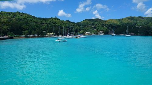 Scenic view of sea against blue sky