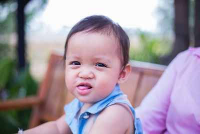 Portrait of cute baby boy outdoors