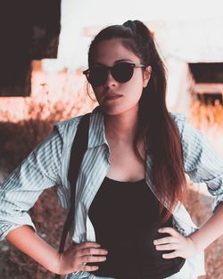 Portrait of young woman wearing sunglasses