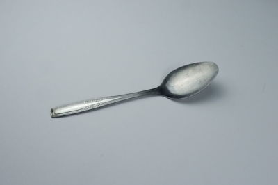 High angle view of fork over white background