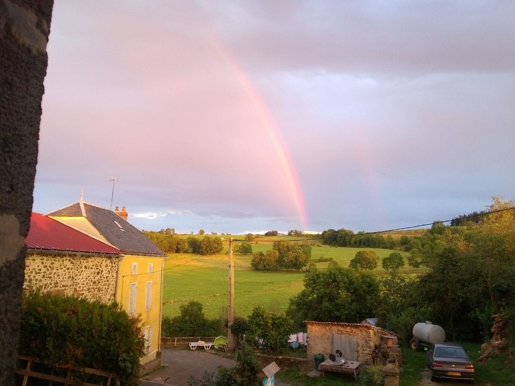 rainbow, sky, building exterior, architecture, built structure, tree, cloud - sky, landscape, house, scenics, beauty in nature, nature, multi colored, field, tranquility, tranquil scene, sunset, grass, idyllic, cloudy