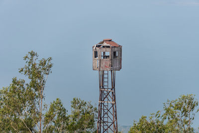 Low angle view of tower against clear blue sky